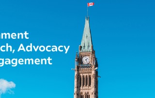 A photo of the Parliament Buildings with the Canadian flag on top and the sky as the background