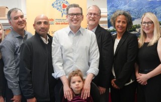 A team of researchers and staff from KBHN pose with Minister Beech and Minister Bains.