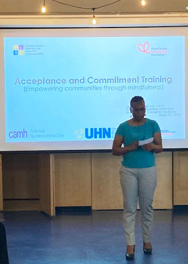 Sheila presenting about the Acceptance and Commitment Training Program